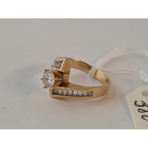 386 - A white stone cross over ring 14ct gold size O    4.2 gms