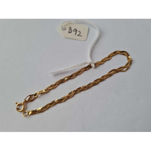 392 - A flat woven gold bracelet 18ct gold 17 inch     2.9 gms