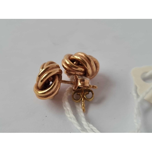 398 - A pair of knot earrings 14ct gold    3gms