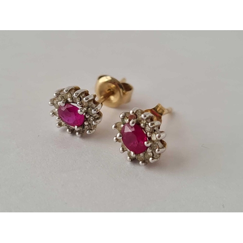 407 - Pair of ruby & diamond 9ct studs