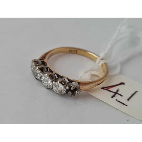 41 - A 5 stone diamond ring (1 stone out) in 18ct gold 2.6g inc