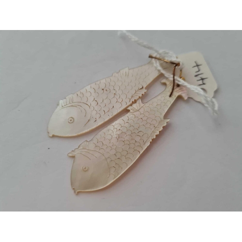 414 - A pair of MOP fish earrings