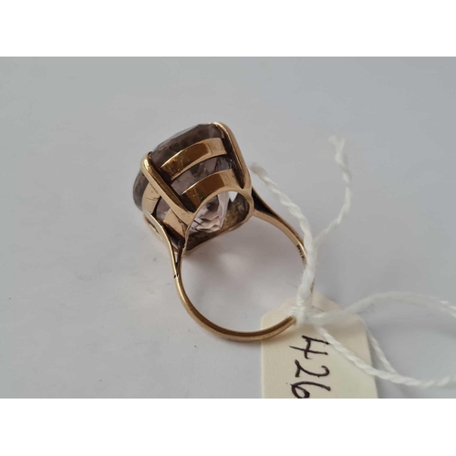 426 - A large stone set dress ring 9crt size M    9.1 gms