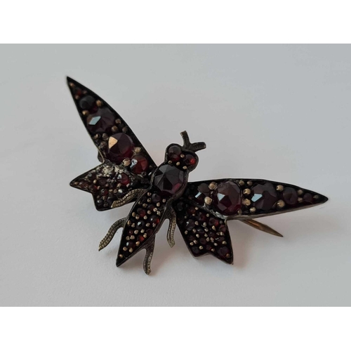 433 - A silver and enamel royal navy bar brooch and a garnet encrusted bug brooch