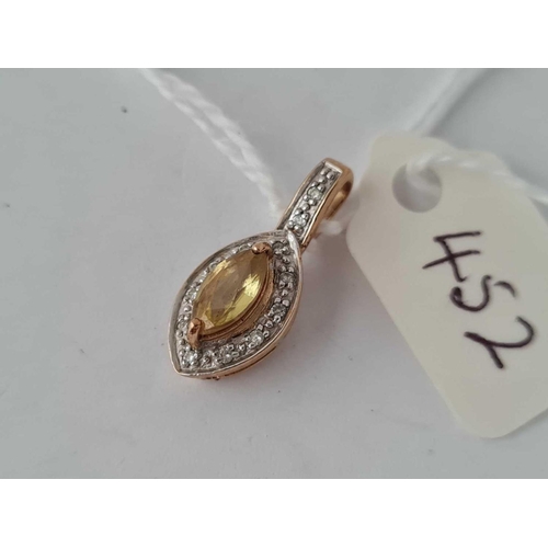 452 - A yellow sapphire and diamond pendant 9ct  1.7g