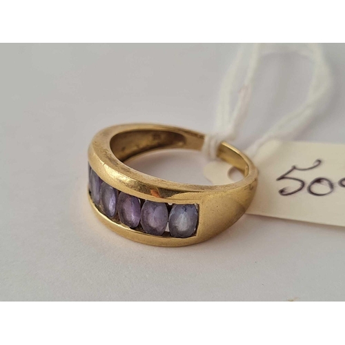 509 - An amethyst set half hoop 9ct ring size M 3g