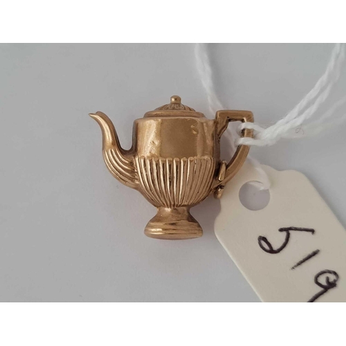 519 - A novelty charm in the form of a tea pot 9ct   1.3 gms