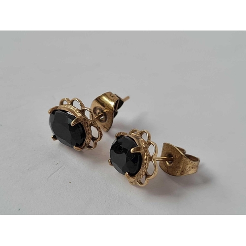 527 - A pair of stone set earrings 9ct