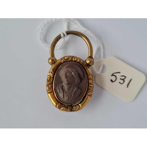 531 - A antique pinchbeck padlock clasp set on one side with a garnet and the other a lava cameo portrait