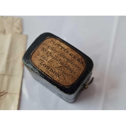 538 - A Georgian horn ring on original box that reads POTTINGERS jewellery man heel St London sold with or... 