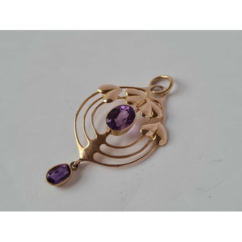 540 - A Edwardian art nouveau gold pendant set with amethyst and signed MB & Co for MURLE BENNETT