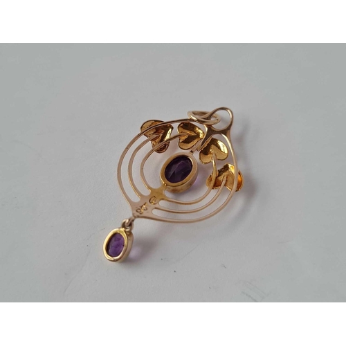 540 - A Edwardian art nouveau gold pendant set with amethyst and signed MB & Co for MURLE BENNETT