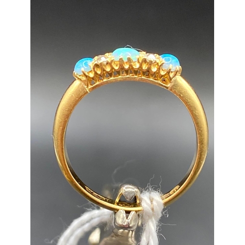 543 - A EXCELLENT 19TH CENTURY THREE STONE OPAL AND DIAMOND RING 18ct Size L