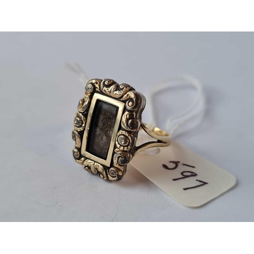 597 - A antique memorial ring with gold shank and locket top size N