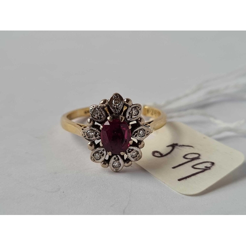 599 - A ruby and diamond cluster ring 18ct gold size O    3.6 gms