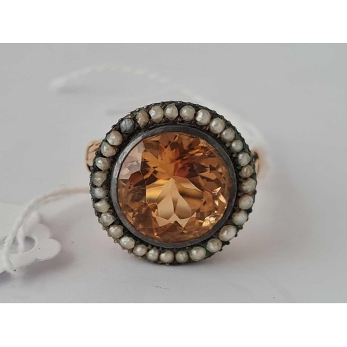 61 - A LARGE CITRINE SET ANTIQUE RING pearl border in high carat ornate mount size P 7.5g boxed