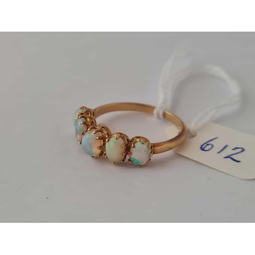 612 - A opal five stone ring set in gold size Q    2.7 gms