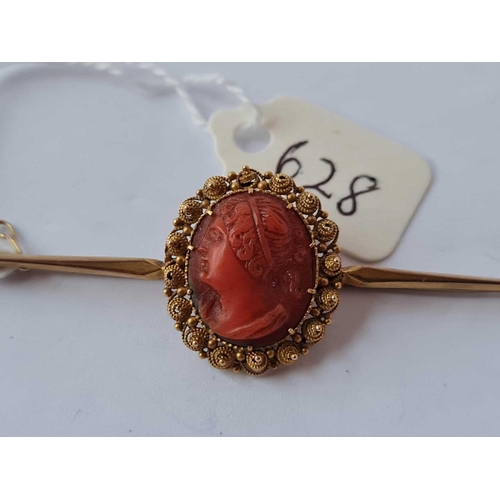 628 - A large gold cameo coral brooch