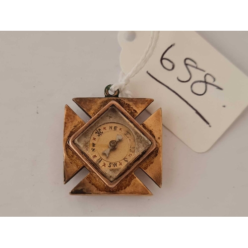 658 - A gilt compass fob in the form of a Maltese cross