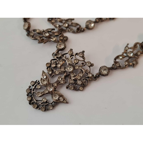 663 - A silver and paste necklace