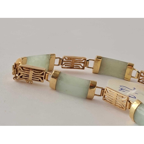 672 - A Gold Jade Panel Bracelet