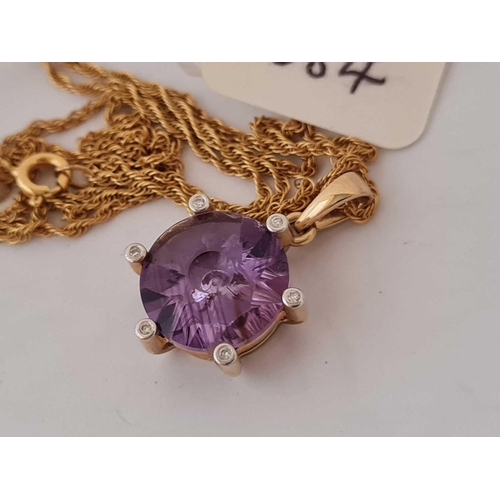 684 - A amethyst diamond pendant on chain 9ct