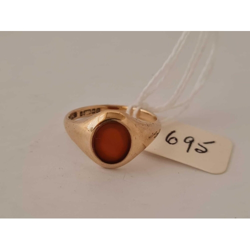 695 - A carnelian set signet ring 9ct size P    3.5 gms