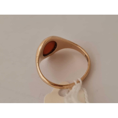 695 - A carnelian set signet ring 9ct size P    3.5 gms