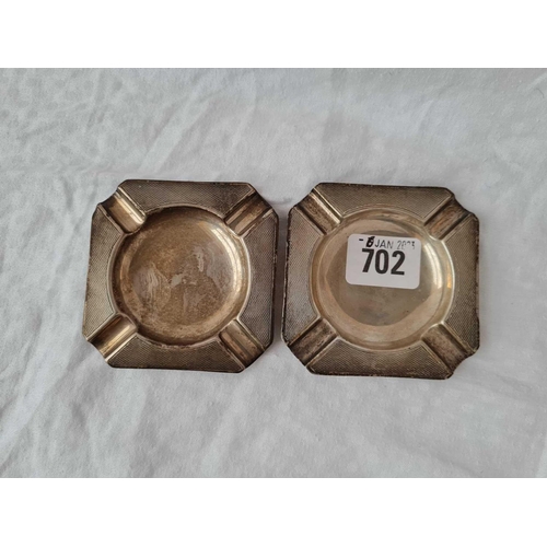 702 - A pair of octagonal ashtrays, engine turned, 3.1/4