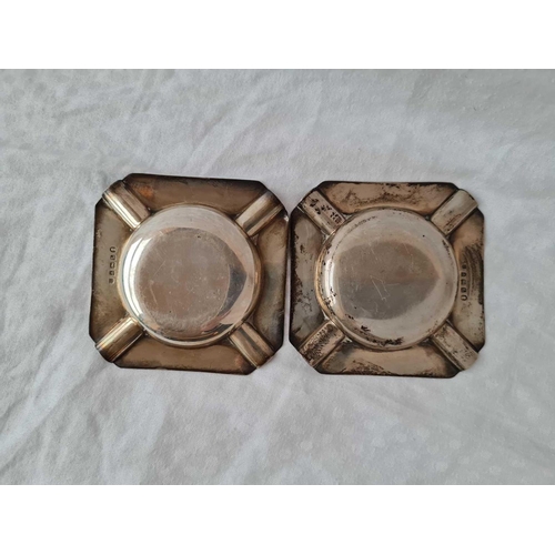 702 - A pair of octagonal ashtrays, engine turned, 3.1/4