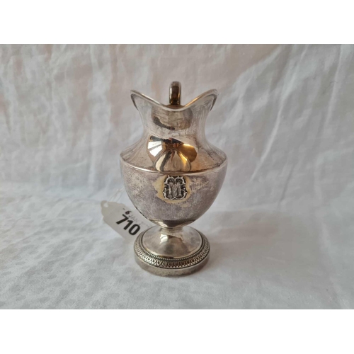 710 - A 19th Century French jug, helmet shaped with scroll handle, 