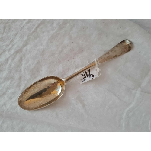 715 - An early 18th Century table  spoon, Hanoverian pattern with crest an rat tail, Dublin by IH, 57g