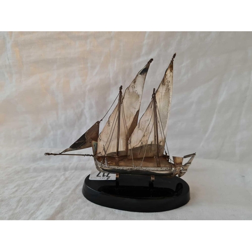 717 - A two masted sailing boat on plinth, 6