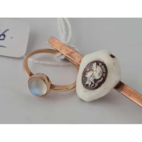 76 - An unusual 9ct bar brooch with Cowrie shell Intaglio and a 9ct moonstone ring