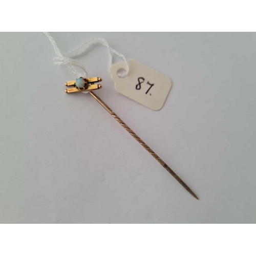 87 - A opal set stick pin 15ct gold