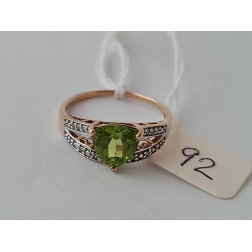 92 - A green stone ring with diamond shoulders 9ct size T   2.5 gms