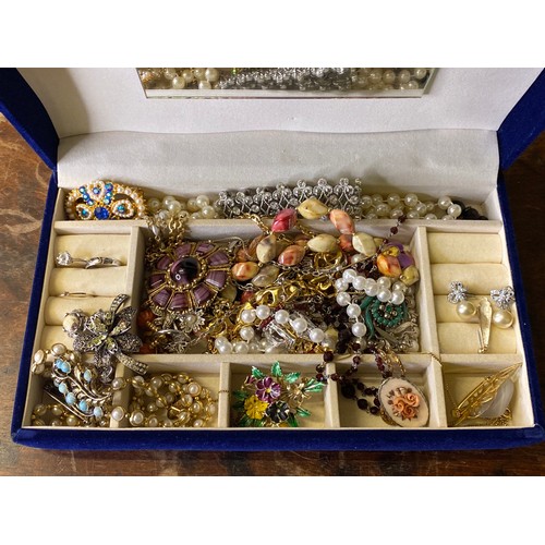 610 - A large box of costume jewellery