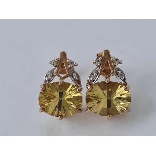 104 - A pair of 9ct diamond and citrine earrings 4g