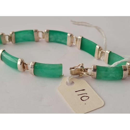 110 - A silver and jade nine panel bracelet clasp missing