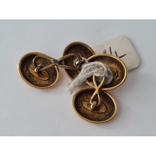 114 - A pair of oval gold cufflinks   7 gms