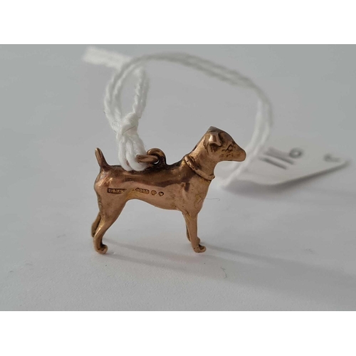 116 - A 9ct dog charm   1.4 gms