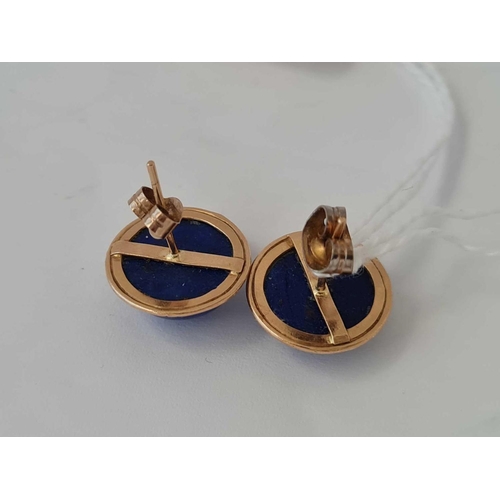 121 - A pair of 9ct and lapis circular ear studs