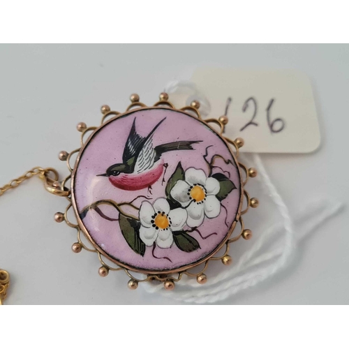 126 - A gold and enamel circular brooch with bird design