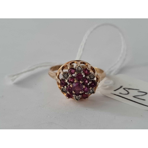 152 - A ruby and diamond cluster ring 9ct size Q    2.8 gms