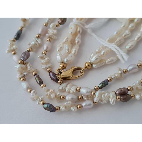 200 - A triple row of river pearls with 14ct gold clasp 16 inch