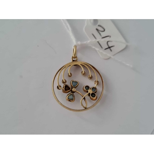 214 - A attractive circular pearl and aquamarine pendant set in gold   2.5 gms