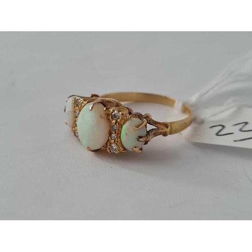 220 - A NINE STONE OPAL AND DIAMOND RING 18CT GOLD SIZE N    4.3 GMS