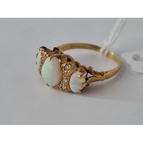 220 - A NINE STONE OPAL AND DIAMOND RING 18CT GOLD SIZE N    4.3 GMS