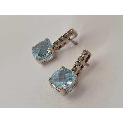 236 - A pair of gold and blue stone ear studs 9ct   1.6 gms