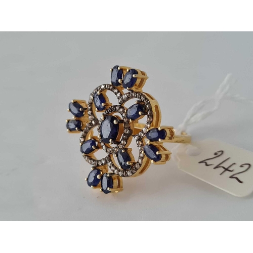 242 - A VERY LARGE YELLOW METAL FINE SAPPHIRE AND DIAMOND DRESS RING BOXED size P